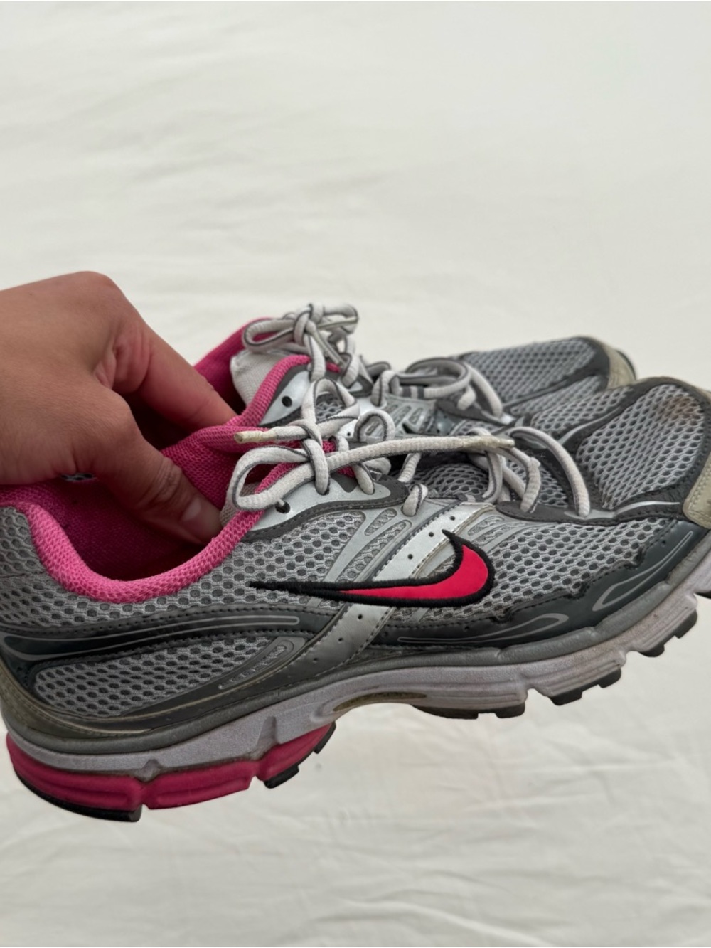 Nike Women’s Gray Running Sneakers with Pink Accents